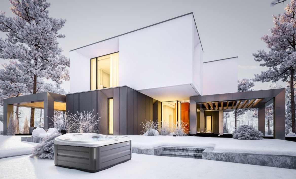 Moderne villa in winterlandschap met jacuzzi