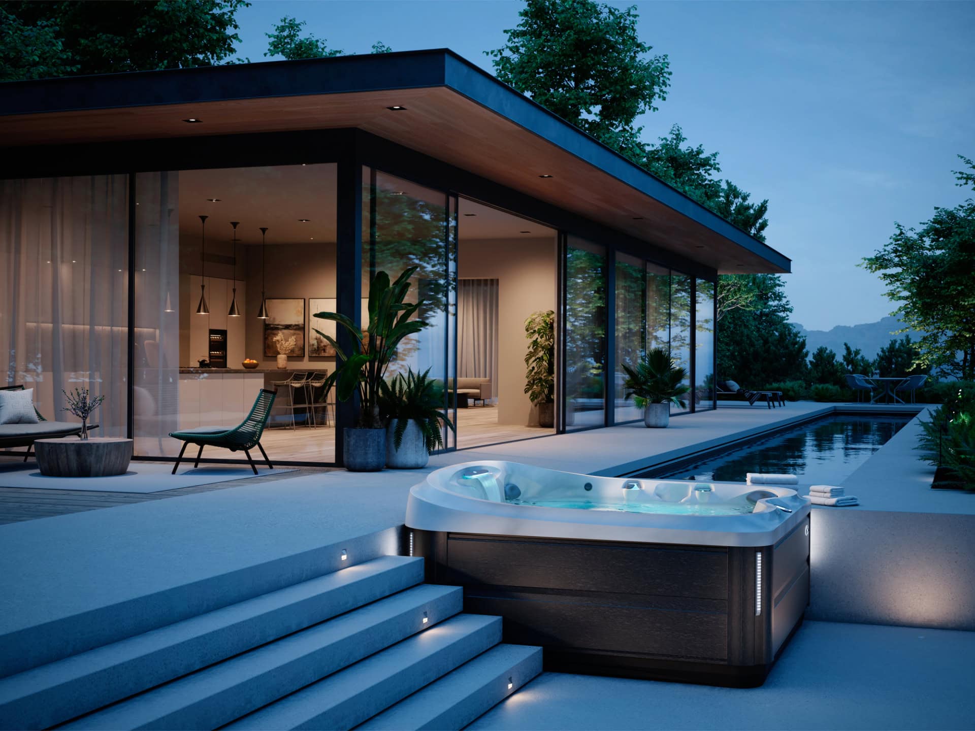 Moderne bungalow met zwembad en jacuzzi s' avonds.